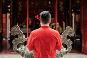 Praying in a temple in Hanoi